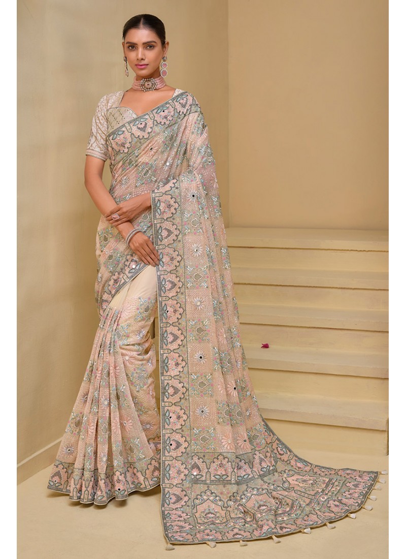 This Designer Saree  Contemporary Draping With A Modern Twist, Featuring A Flowing Hand-Embroidered Sequins And Beads In A Geometric Pattern, With A Touch Of Subtle Glitter